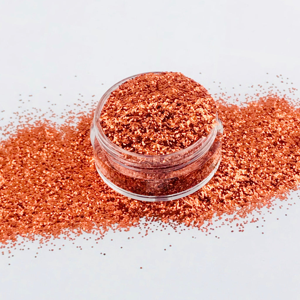orange polyester glitter for art, body, nails and more - PDB Creative Studio